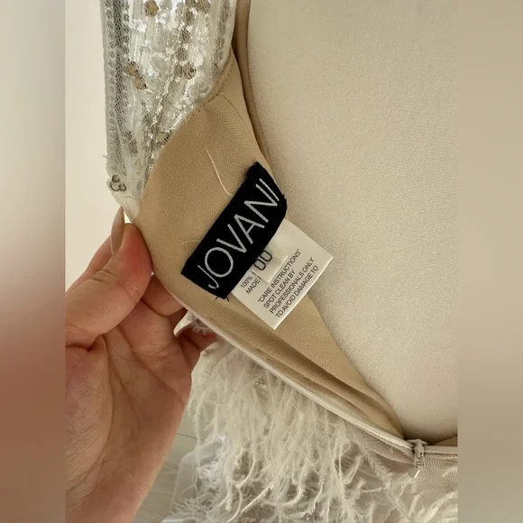 New Jovani 03023 Sheer Embellished Bodice
Feather Gown|Cream|00|Missing Tags - Picture 17 of 17